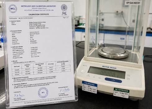 NABL calibration certificate showing laboratory instrument calibration on an analytical balance in Bangalore